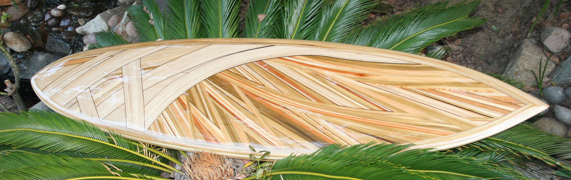 A beautiful wood inlay surfboard