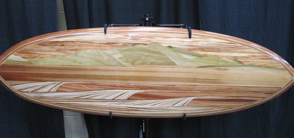 A beautiful wood inlay surfboard